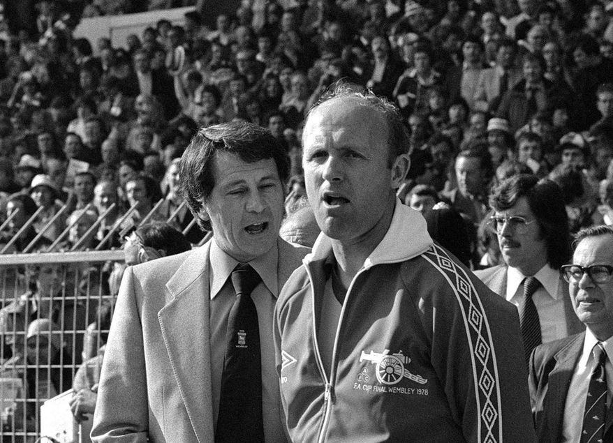 FILE - This May 6, 1978 file photo shows Don Howe, right, in London. Don Howe, a former England defender who became a key member of the England coaching staff, has died. He was 80. Howe's death was announced Wednesday Dec. 23, 2015 by the English Football Association as well as West Bromwich Albion and Arsenal, two teams he played for and managed. (PA via AP, File)