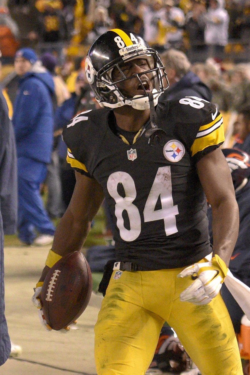 FILE - This Dec. 20, 2015 file photo shows Pittsburgh Steelers wide receiver Antonio Brown (84) celebrating after making a catch and going out of bounds in the Denver Broncos bench area during the second half of an NFL football game in Pittsburgh. The Steelers will face the Baltimore Ravens on Sunday, Dec. 27, 2015. (AP Photo/Don Wright, file)