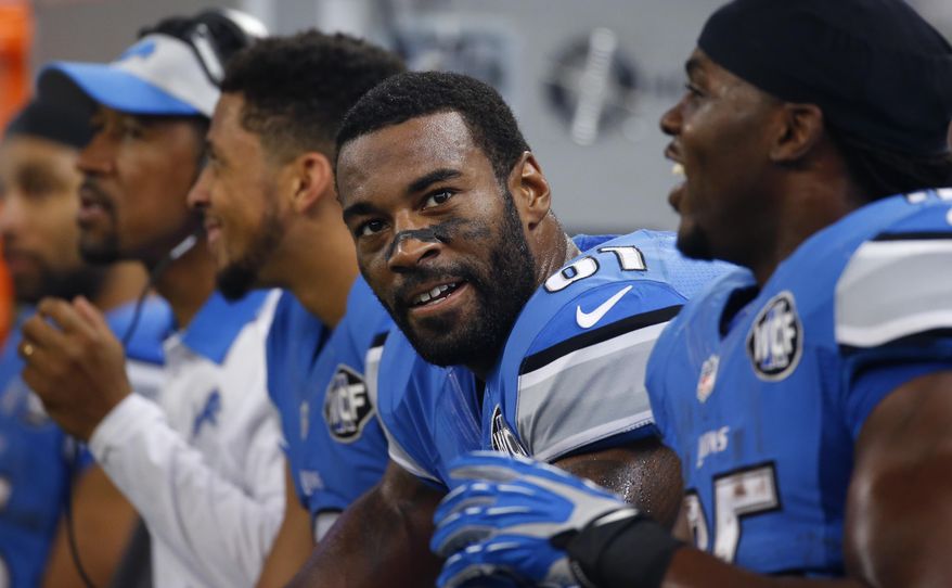 FILE - In this Nov. 26, 2015, file photo, Detroit Lions wide receiver Calvin Johnson (81) sits on the bench during the second half of an NFL football game against the Philadelphia Eagles, in Detroit. The Lions will play against the San Francisco 49ers on Sunday, Dec. 27, 2015. (AP Photo/Paul Sancy, File)