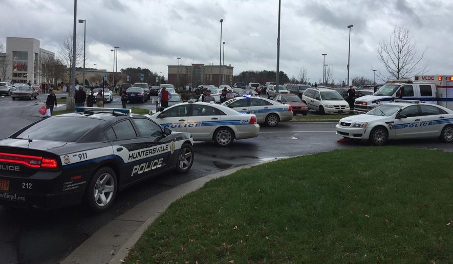 Authorities respond to the scene of a shooting at the Northlake Mall in Charlotte, N.C., Thursday, Dec. 24, 2015. (Associated Press)