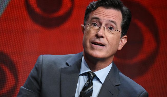 Stephen Colbert participates in &quot;The Late Show with Stephen Colbert&quot; segment of the CBS Summer TCA Tour in Beverly Hills, Calif., on Aug. 10, 2015. (Richard Shotwell/Invision/AP) **FILE**