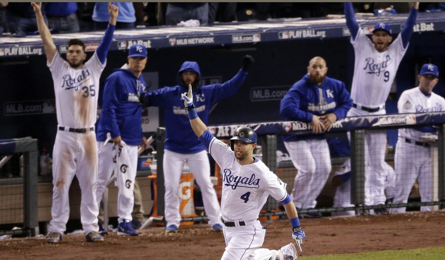 Kansas City Royals&#x27; Alex Gordon celebrates a solo home run off New York Mets relief pitcher Jeurys Familia during the ninth inning of Game 1 of the Major League Baseball World Series in Kansas City, Mo. (AP Photo/Charlie Riedel, File)