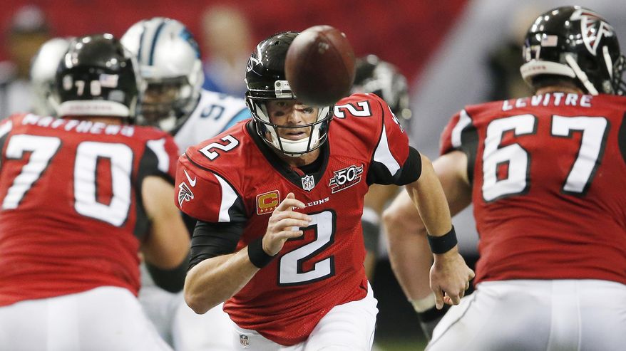 Atlanta Falcons quarterback Matt Ryan (2) chases a loose ball during the second half of an NFL football game against the Carolina Panthers, Sunday, Dec. 27, 2015, in Atlanta. Carolina Panthers cornerback Josh Norman recovered the ball. (AP Photo/John Bazemore)