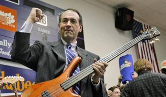 Rock fan and Republican presidential hopeful Mike Huckabee has his own band, Capitol Offense, in which the former Arkansas governor plays bass. Fellow 2016 hopeful Martin O&#39;Malley also has a band. (Associated Press)