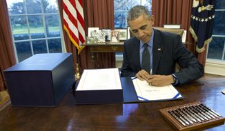 President Obama is piling up red tape just as fast as conservatives are plotting to cut it after he departs. (Associated Press)