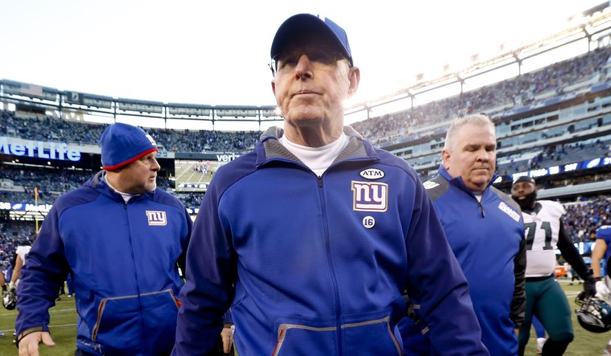 New York Giants head coach Tom Coughlin walks off the field after the Giants lost 35-30 to the Philadelphia Eagles in an NFL football game, Sunday, Jan. 3, 2016, in East Rutherford, N.J. (AP Photo/Julio Cortez)