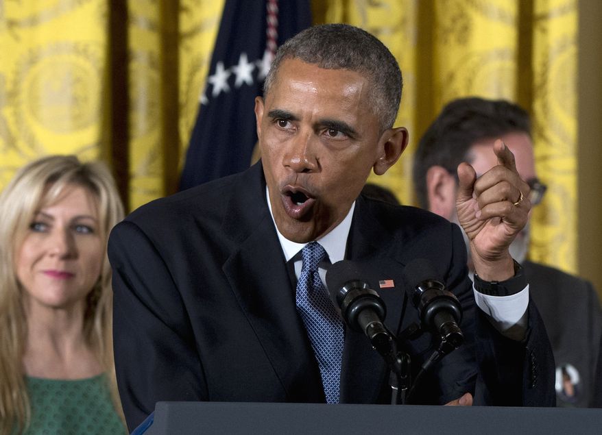 President Barack Obama speaks in the East Room of the White House in Washington, Tuesday, Jan. 5, 2016, about steps his administration is taking to reduce gun violence. Also on stage are stakeholders, and individuals whose lives have been impacted by the gun violence. (AP Photo/Carolyn Kaster) ** FILE **