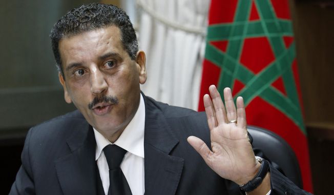 The director of the Central Bureau of Judicial Investigations, Abdelhak Khiame, gestures during an interview with The Associated Press at his headquarters in Sale near Rabat, Morocco, Tuesday, Jan. 5, 2016. Khiame says it was his country that put French and Belgian police on the trail of the network behind the Paris attacks that killed 130, and likely spared more lives by pinpointing the location of the man considered the main organizer, holed up outside the French capital. (AP Photo/Abdeljalil Bounhar)