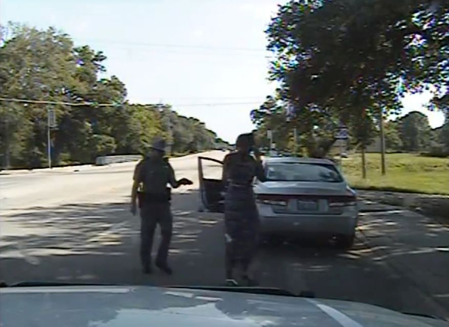 In this image made from dashcam video provided the the Texas Department of Public Safety, state trooper Brian Encinia arrests Sandra Bland after a routine traffic stop in Waller County, Texas, on July 10, 2015. (Texas Department of Public Safety via Associated Press)
