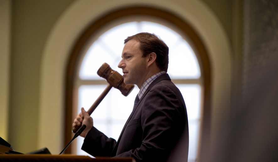 FILE- In this June 16, 2015, file photo, House Speaker Mark Eves presides over state representatives during budget discussions at the State House in Augusta, Maine. House Democrats on Wednesday, Jan. 6, 2016, agreed on the opening day of the session to focus on other priorities like addressing the drug crisis, Eves said. (AP Photo/Robert F. Bukaty, File)