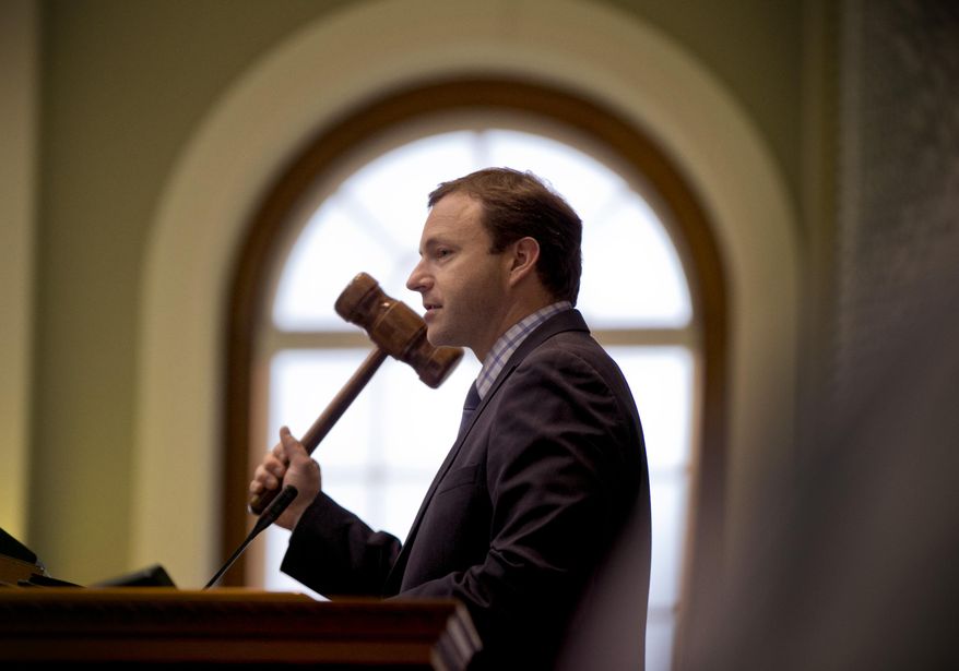 FILE- In this June 16, 2015, file photo, House Speaker Mark Eves presides over state representatives during budget discussions at the State House in Augusta, Maine. House Democrats on Wednesday, Jan. 6, 2016, agreed on the opening day of the session to focus on other priorities like addressing the drug crisis, Eves said. (AP Photo/Robert F. Bukaty, File)