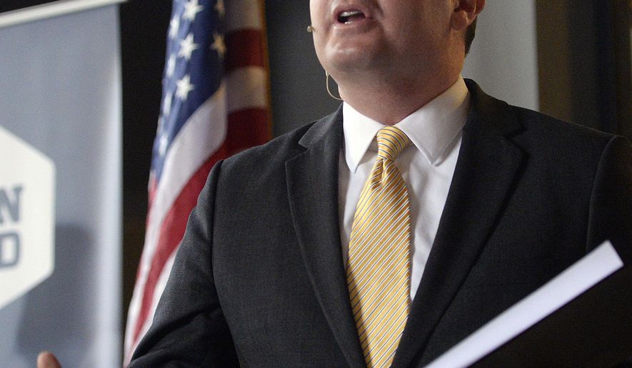 Utah Sen. Mike Lee holds a roundtable with young professionals in the tech industry at Church and State in Salt Lake City, Wednesday, Jan. 6, 2016. Lee said an armed group that took over federal buildings at an Oregon wildlife refuge should stand down and nothing in his Mormon beliefs justifies their actions. (Al Hartmann/The Salt Lake Tribune via AP) DESERET NEWS OUT; LOCAL TELEVISION OUT; MAGS OUT; MANDATORY CREDIT