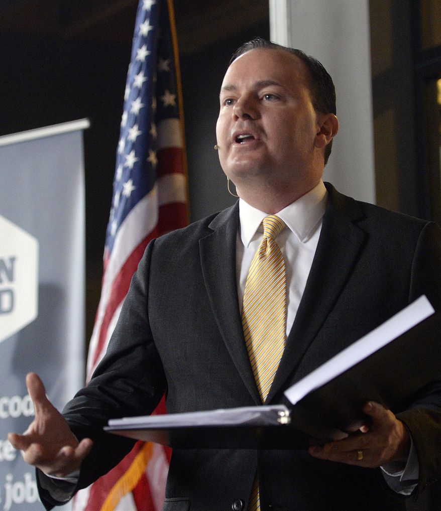 Utah Sen. Mike Lee holds a roundtable with young professionals in the tech industry at Church and State in Salt Lake City, Wednesday, Jan. 6, 2016. Lee said an armed group that took over federal buildings at an Oregon wildlife refuge should stand down and nothing in his Mormon beliefs justifies their actions. (Al Hartmann/The Salt Lake Tribune via AP) DESERET NEWS OUT; LOCAL TELEVISION OUT; MAGS OUT; MANDATORY CREDIT