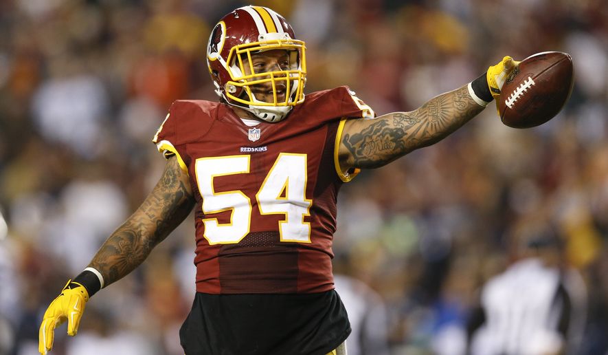 Washington Redskins linebacker Mason Foster (54) celebrates after a play during the second half of an NFL football game against the Dallas Cowboys in Landover, Md., Monday, Dec. 7, 2015. (AP Photo/Patrick Semansky)