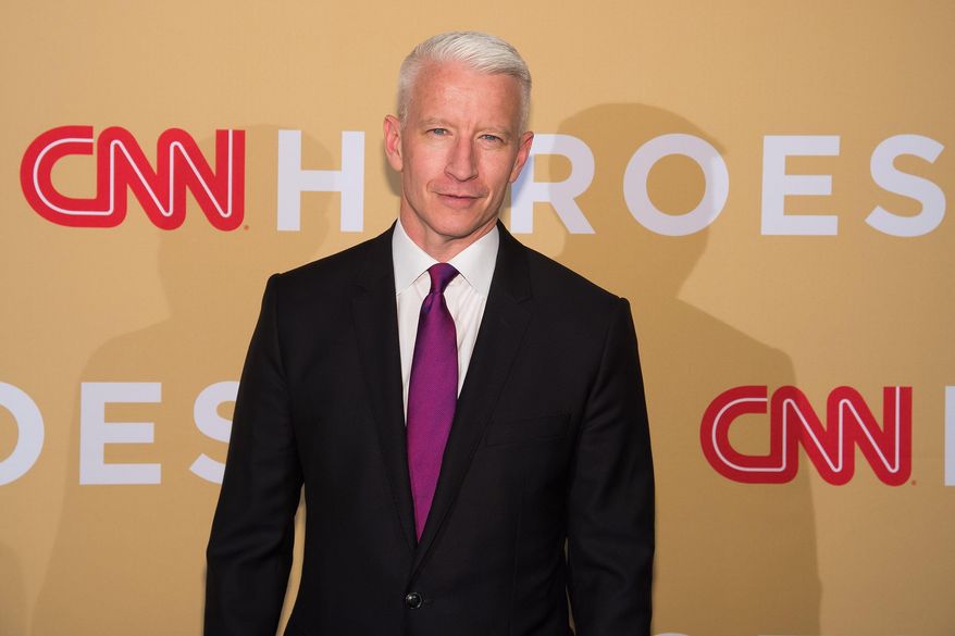 In this Nov. 17, 2015 file photo, Anderson Cooper attends CNN Heroes: An All-Star Tribute in New York. A joint memoir by Anderson Cooper and Gloria Vanderbilt will be published on April 5, just days before the airing of an HBO documentary featuring the famous designer-socialite and her CNN anchor-son. (Photo by Charles Sykes/Invision/AP/File)
