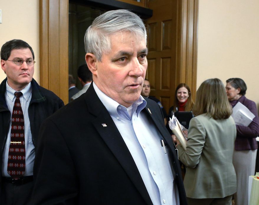 FILE - In this March 20, 2015 file photo, Kansas State Rep. John Bradford, R-Lansing, appears at the Statehouse in Topika, Kan. Bradford said Thursday, Jan. 7, 2016, that he regrets his recent sharing on Facebook of a posting that mocks English spoken with a Hispanic accent to make a crude comment about President Barack Obama, which critics saw as racist. Bradford says sharing the post was in bad taste. (Thad Allton/Topeka Capital-Journal via AP, File)