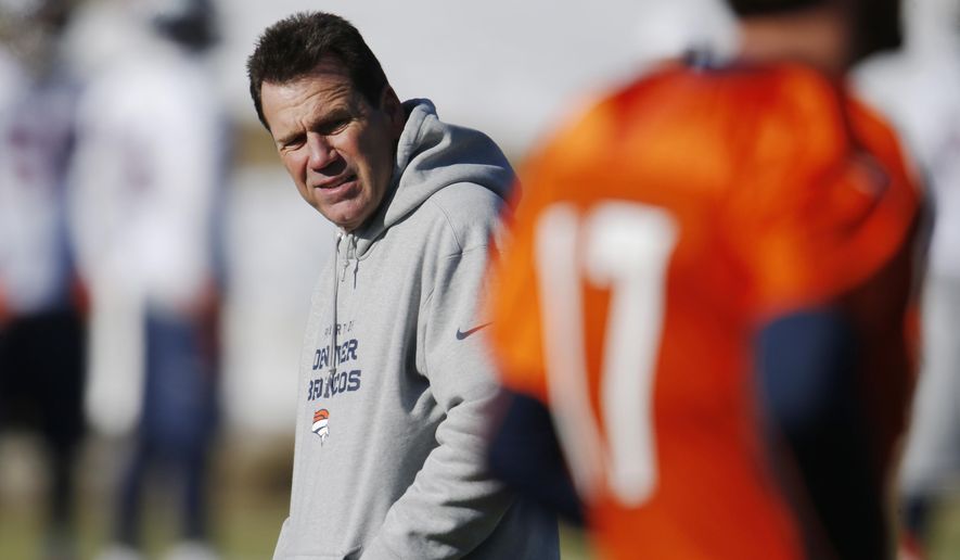 FILE - In this Dec. 23, 2015, file photo, Denver Broncos head coach Gary Kubiak, back, casts ay eye toward quarterback Brock Osweiler during an NFL football practice in Englewood, Colo. The Broncos settled on quarterback Peyton Manning. Certainly, Broncos coach Kubiak could've justified placing either quarterback in the starting lineup. And if Denver loses next Sunday, then certainly, Kubiak's choice will be second-guessed. (AP Photo/David Zalubowski, File)