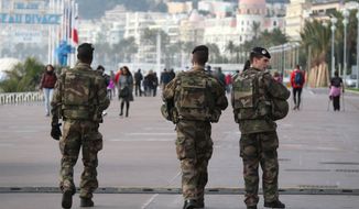 French soldiers patrol on the Promenade des Anglais in Nice, southeastern France, Friday, Jan. 8, 2016. It&#39;s a year since an attack on the French satirical newspaper Charlie Hebdo launched a bloody year in Paris. Tensions in France, under a state of emergency since a wave of attacks on Nov. 13, have been even higher this week as the anniversary of the January attacks approached. (AP Photo/Lionel Cironneau)