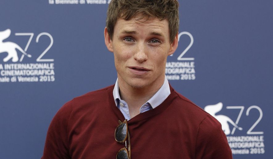 FILE - In this Saturday, Sept. 5, 2015 file photo, actor Eddie Redmayne poses during the photo call for the movie The Danish Girl at the 72nd edition of the Venice Film Festival in Venice, Italy. Cold War thriller "Bridge of Spies" and lush lesbian romance "Carol" lead nominations for the British Academy Film Awards, while Eddie Redmayne has a chance to win a second straight best-actor prize with his role as a transgender artist in “The Danish Girl.” “The Danish Girl” _ based on the life of early 20th-century transgender woman Lili Elbe _ received five nominations Friday, Jan. 8, 2016 including acting nods for Redmayne and co-star Alicia Vikander. Last year Redmayne won the same prize _ and an Oscar _ for Stephen Hawking biopic "The Theory of Everything." (AP Photo/Andrew Medichini, File)
