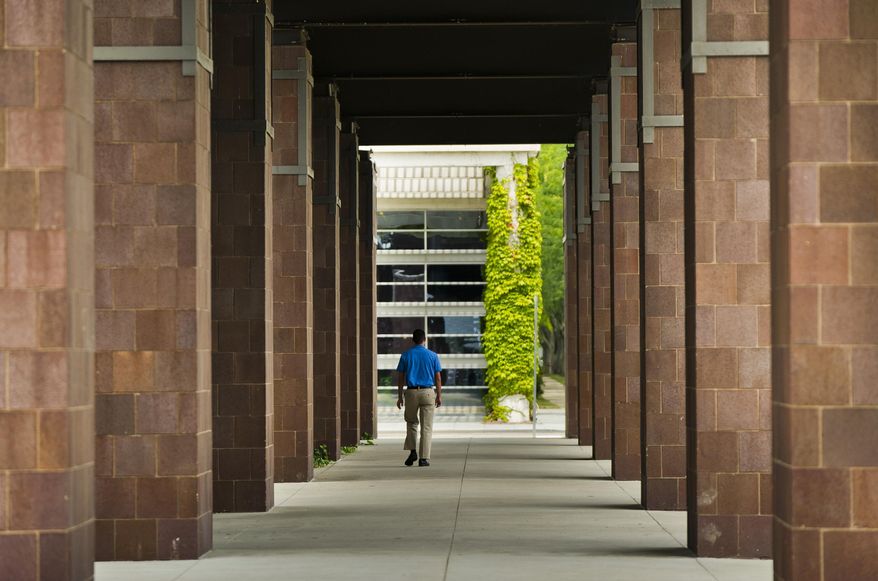 This photo taken Aug. 15, 2013, shows part of the Columbus Post Office in Columbus, Ond. The building was designed by famed architect Kevin Roche. (Andrew Laker/The Republic via AP) MANDATORY CREDIT