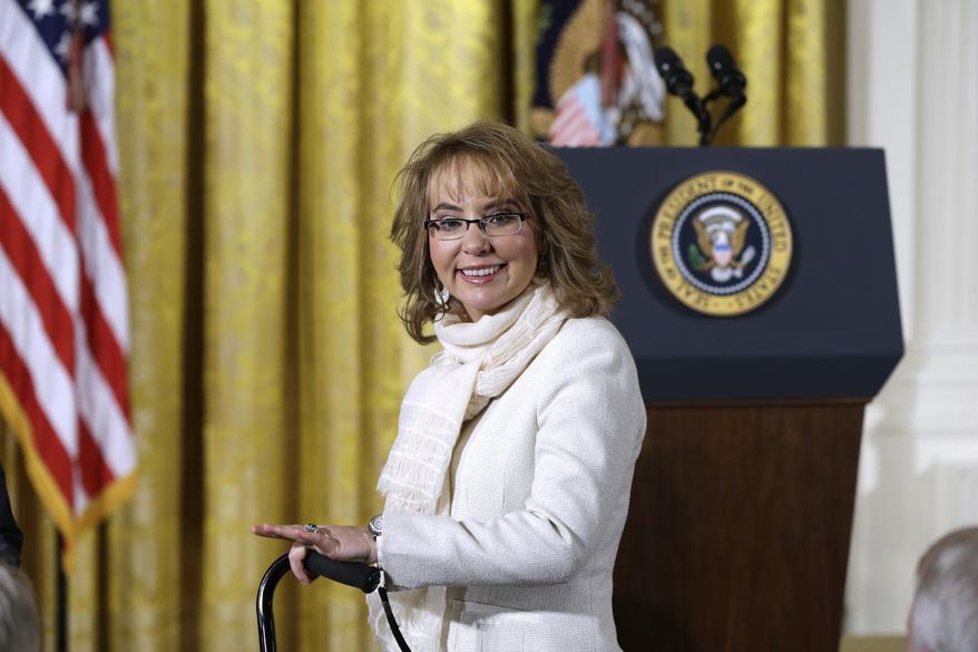 In this file photo from Tuesday, Jan. 5, 2016, former Arizona Rep. Gabby Giffords arrives in the East Room of the White House in Washington to hear President Obama speak about steps his administration is taking to reduce gun violence. In past five years, Giffords has hiked the Grand Canyon, raced in a 40-mile bike ride, sky dived and founded an advocacy group that helped convince President Obama to take executive action on gun control. (AP Photo/Carolyn Kaster)