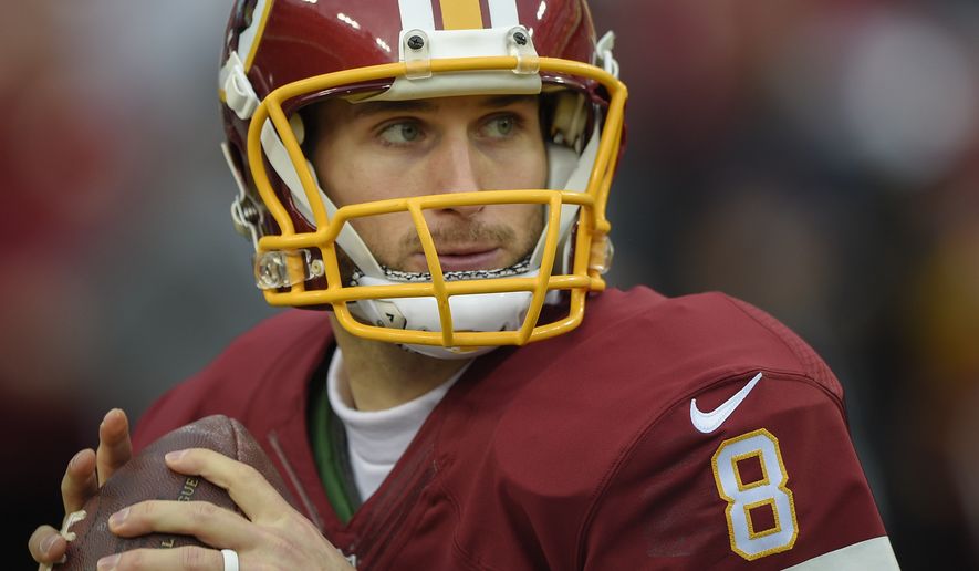 Washington Redskins quarterback Kirk Cousins (8) warms up before an NFL wild card playoff football game against the Green Bay Packers in Landover, Md., Sunday, Jan. 10, 2016. (AP Photo/Nick Wass)