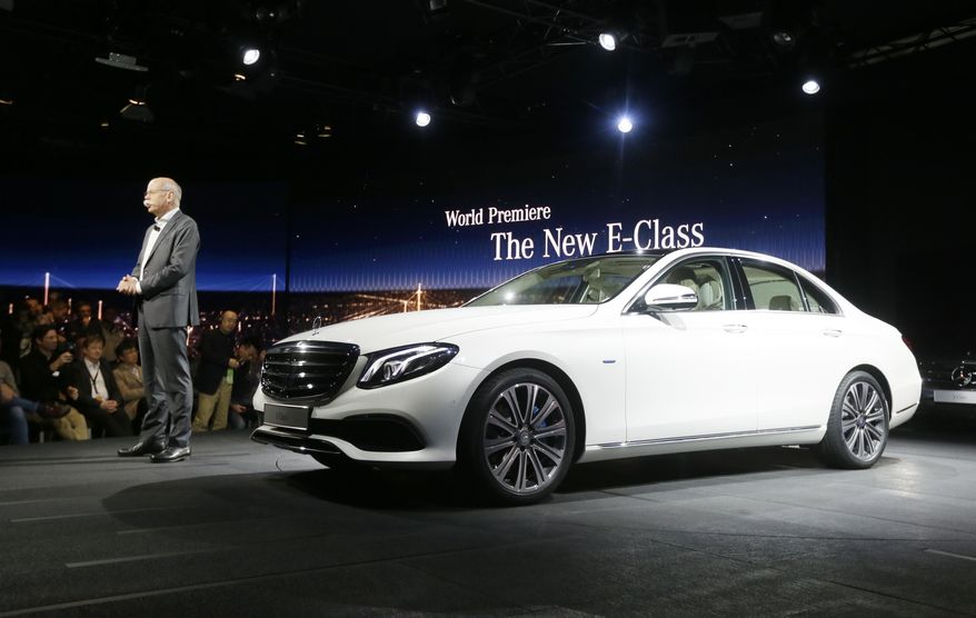 Dr. Dieter Zetsche, chairman of the board of management Daimler AG and Head of Mercedes-Benz Cars addresses the media as the automaker unveils the new E-Class sedan during a preview night for the North American International Auto Show, Sunday, Jan. 10, 2016 in Detroit. (AP Photo/Carlos Osorio)
