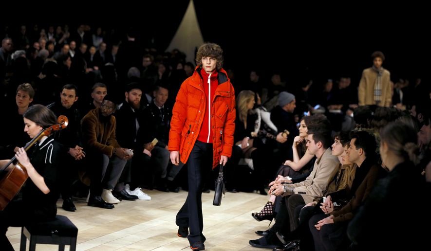 A model displays an outfit during the Men's Burberry Prorsum 2016 fashion show in London, Monday, Jan. 11, 2016. (AP Photo/Kirsty Wigglesworth)