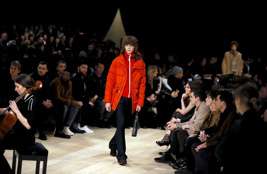 A model displays an outfit during the Men's Burberry Prorsum 2016 fashion show in London, Monday, Jan. 11, 2016. (AP Photo/Kirsty Wigglesworth)