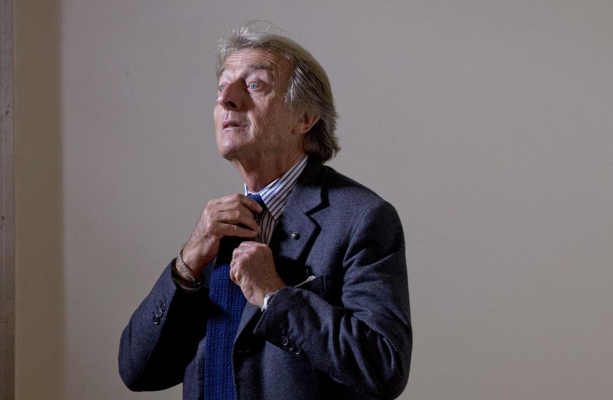 Rome 2024 Olympic bid committee chairman Luca Cordero di Montezemolo adjusts his tie as he arrives for a press conference at the foreign press association in Rome, Monday, Jan. 11, 2016. The chairman of Rome's bid for the 2024 Olympics doesn't see the "necessity" for a public referendum on the candidacy. Luca Cordero di Montezemolo points out that Rome's city council voted "nearly unanimously" in support of the bid last year, "and the government has expressed maximum support, so we don't see the necessity." (AP Photo/Alessandra Tarantino)