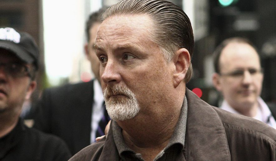 In this May 14, 2014 photo, former Chicago transportation official John Bills leaves the federal building in Chicago after being arrested for allegedly taking cash and gifts to steer more than $100 million to Phoenix-based Redflex Traffic Systems Inc. Jury selection is scheduled to begin Monday, Jan. 11, 2016, in Bills’ bribery trial. (Kevin Tanaka/Chicago Sun-Times via AP) CHICAGO TRIBUNE OUT, MANDATORY CREDIT, MAGS OUT, NO SALES