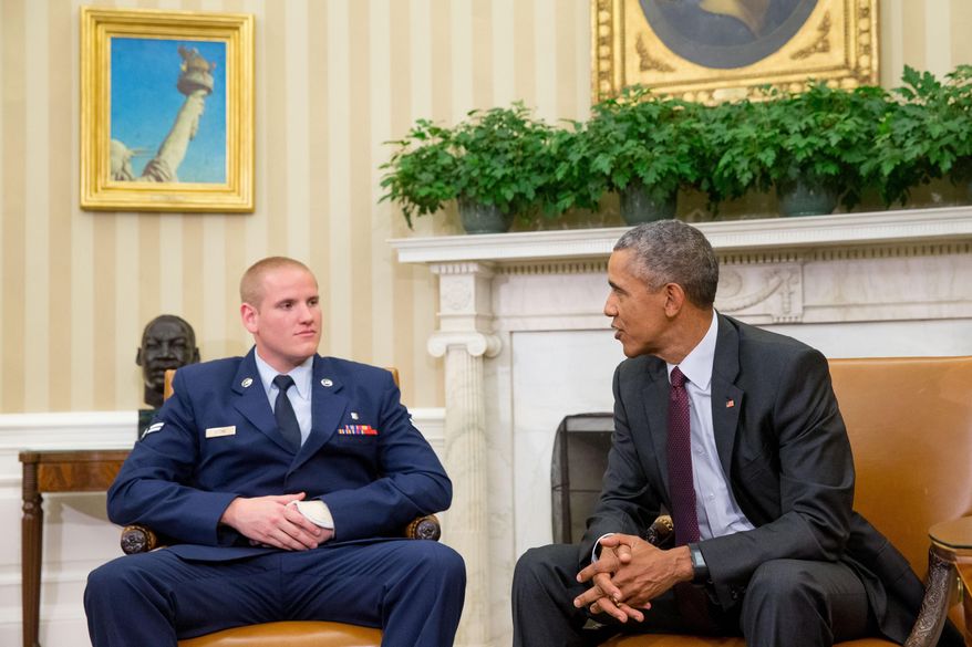 FILE - In this Sept. 17, 2015 file photo, President Barack Obama speaks to Air Force Airman 1st Class Spencer Stone in the Oval Office of the White House in Washington. Stone, one of three Americans to thwart a terrorist attack on a Paris-bound train, will be a guest of First Lady Michelle Obama at the State of the Union. Staff Sgt. Spencer Stone told The Associated Press, Monday, Jan. 11, 2016, that attending Tuesday's presidential address will be the highlight of the revelry that followed the thwarted train attack. (AP Photo/Andrew Harnik, File)