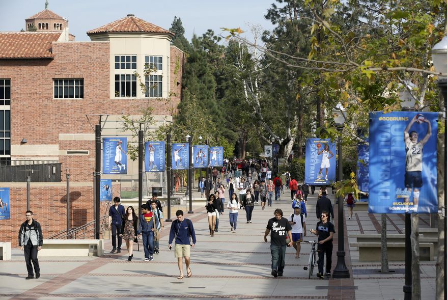 Students walk on the UCLA campus in Los Angeles on Feb. 26, 2015. (Associated Press)