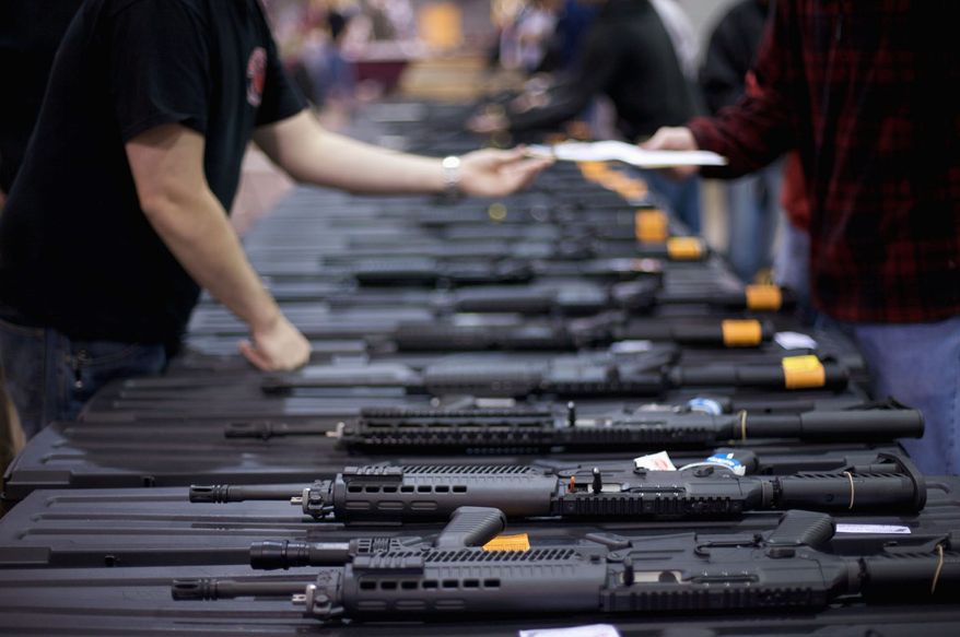 There were 91 arrests stemming from gun shows to go along with the 278 sales that were halted, out of a total of 35,535 transactions, according to the Virginia Firearms Transaction Center. (Associated Press)