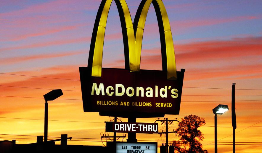 In this Saturday, Oct. 10, 2015 photo, the sun sets behind a McDonald&#39;s restaurant in Ebensburg, Pa. On Tuesday, Jan. 12, 2016 the European Union said it will analyze an antitrust complaint targeted at the McDonald’s which accuses the fast food giant of abusing its dominant position by at the expense of both its franchisees and consumers. The complaint comes on top of last month’s opening of an EU investigation whether McDonald&#39;s received a sweet tax deal from Luxembourg. (AP Photo/Gene J. Puskar, File)
