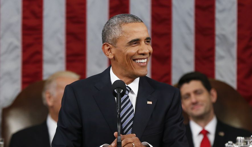 President Barack Obama smiles during his State of the Union address to a joint session of Congress on Capitol Hill in Washington, Tuesday, Jan. 12, 2016. (AP Photo/Evan Vucci, Pool)