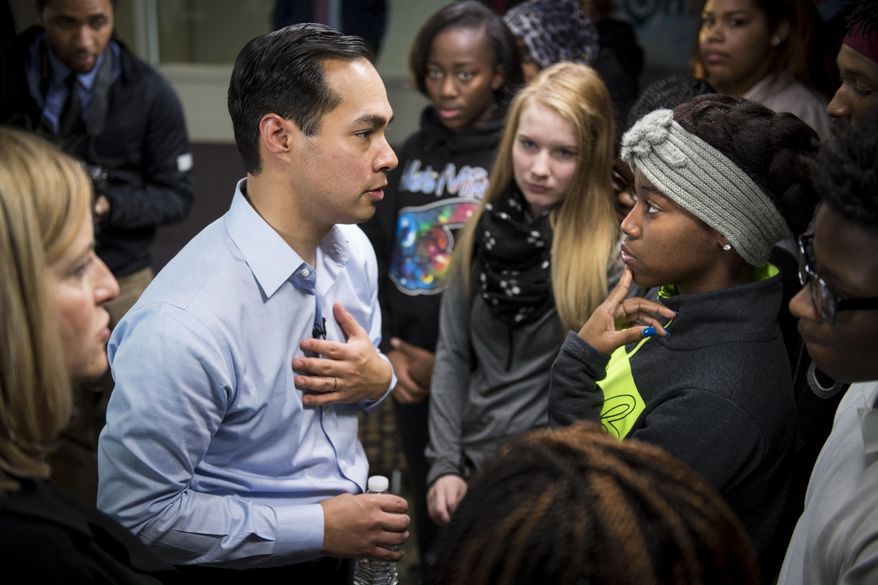 Housing and Urban Development Secretary Julian Castro speaks with Terra Flye, 17, at Stratford High School, Wednesday, Jan. 13, 2016, in Nashville, Tenn. Castro spoke about Internet connectivity and education. (Andrew Nelles/The Tennessean via AP)