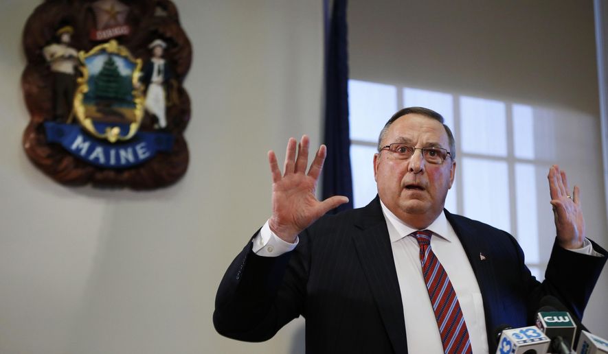 FILE - In a Friday, Jan. 8, 2016 file photo, Gov. Paul LePage speaks at a news conference at the State House, in Augusta, Maine, where he apologized for his remark about out-of-state drug dealers impregnating "young white" girls. For five years now, the Republican has slung crude insults at his adversaries, heaped abuse on the media and offended many with his brass-knuckle tactics and off-the-cuff remarks. On Thursday, Jan. 14, lawmakers take up a longshot bid to impeach him. (AP Photo/Robert F. Bukaty, File)