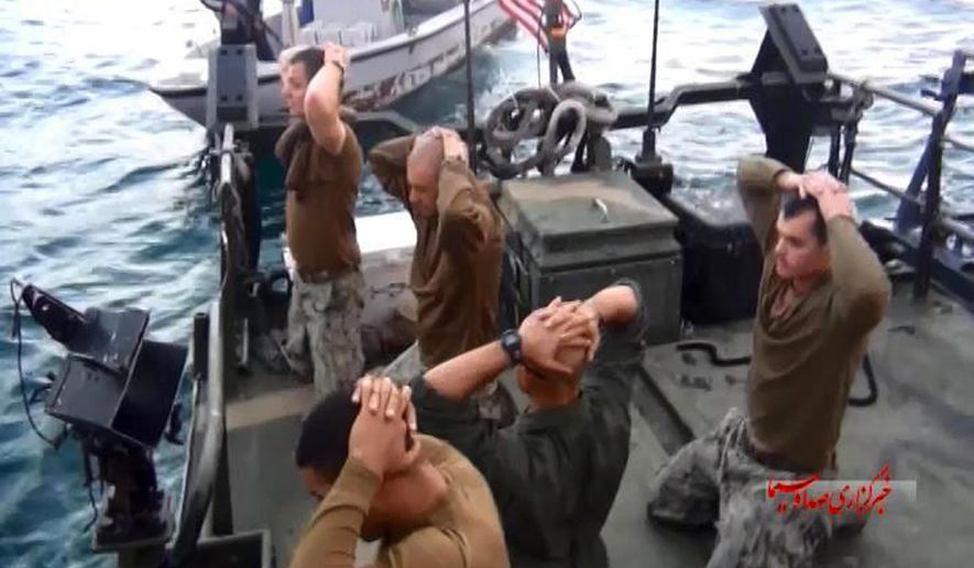 This frame grab from a Jan. 12, 2016, video by the Iranian state-run IRIB News Agency, shows detention of American Navy sailors by the Iranian Revolutionary Guards in the Persian Gulf, Iran. (IRIB News Agency via AP) ** FILE **