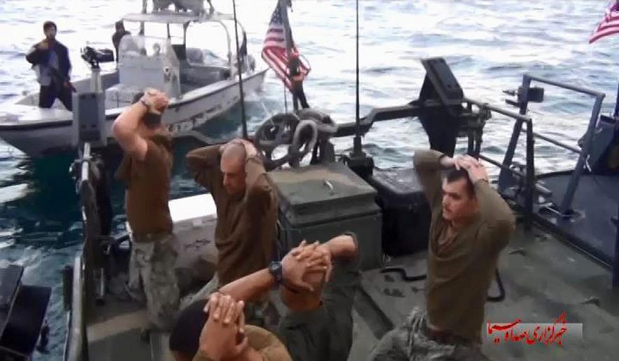 U.S. sailors in the custody of Iranian naval forces. (Associated Press) ** FILE **
