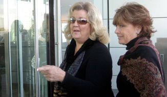Kathleen Willey (right) and Juanita Broddrick, both of whom accused former President Bill Clinton of sexual misconduct, enter Mr. Clinton&#39;s presidential library in Little Rock, Ark., on Oct. 26, 2005. (Associated Press) ** FILE **