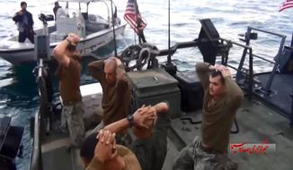 This frame grab from Tuesday, January 12, 2016 video by the Iranian state-run IRIB News Agency, shows detention of American Navy sailors by the Iranian Revolutionary Guards in the Persian Gulf, Iran. The 10 U.S. Navy sailors detained by Iran after their two small boats allegedly drifted into Iranian territorial waters around one of Iran&#x27;s Persian Gulf islands a day earlier have been freed, the United States and Iran said Wednesday. (IRIB News Agency via AP)