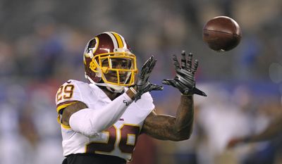 Washington Redskins cornerback Chris Culliver catches a pass before an NFL football game against the New York Giants Thursday, Sept. 24, 2015, in East Rutherford, N.J.  (AP Photo/Bill Kostroun)