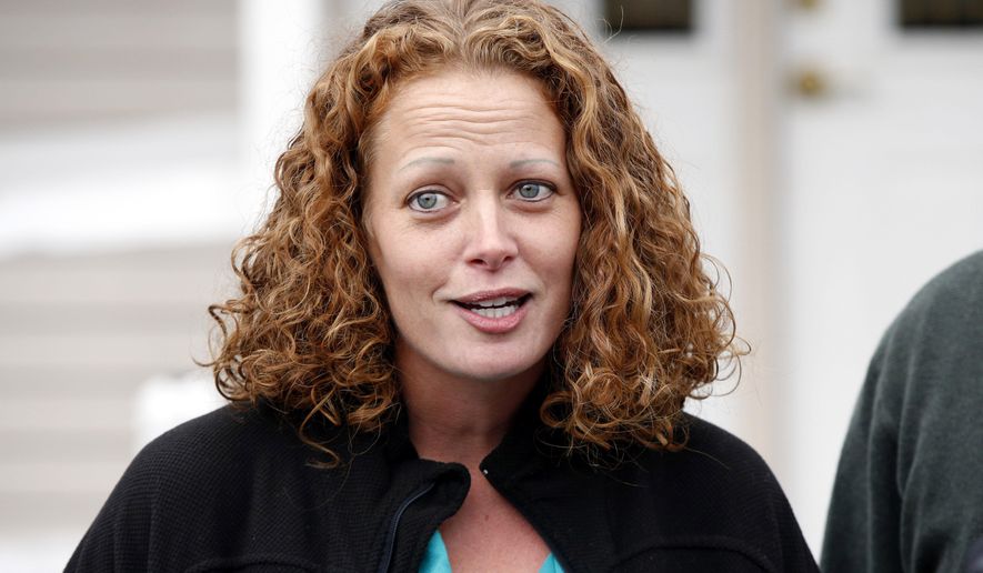 FILE - In this Oct. 31, 2014 file photo, nurse Kaci Hickox speaks to the media outside her home in Fort Kent, Maine. On Friday, Jan. 15, 2016, lawyers for New Jersey Gov. Chris Christie and state health officials have asked a judge to throw out a lawsuit from the nurse who sharply criticized being quarantined at a hospital because she had contact with Ebola patients in West Africa in 2014. (AP Photo/Robert F. Bukaty, File)