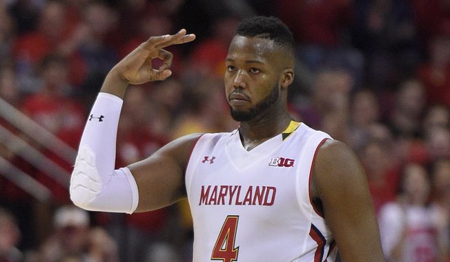 Maryland forward Robert Carter (4) gestures after he hit a basket during the second half of an NCAA college basketball game against the Ohio State, Saturday, Jan. 16, 2016, in College Park, Md. Maryland won 100-65. (AP Photo/Nick Wass)