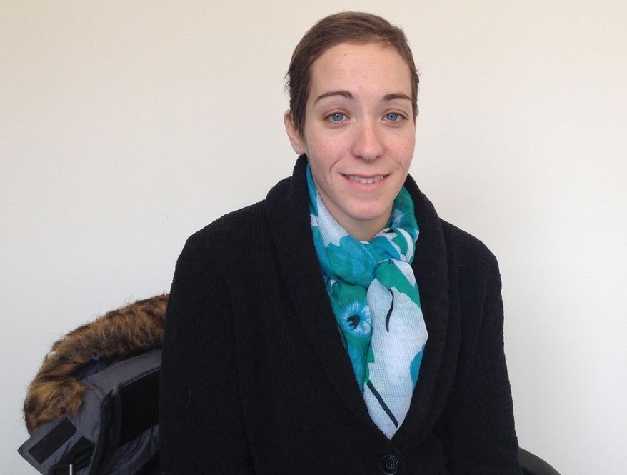 In this photo taken on Friday, 12, 2016, Brittany Barger, 27, who suffers from advanced ovarian cancer, poses for a photo at Vireo Health, a suburban medical marijuana dispensary in White Plains, N.Y. When medical marijuana became legal this month in New York, one of the strictest among the 23 states to legalize the drug for medical purposes, Barger was one of the first patients though the dispensaries’ doors because her doctor was willing to take a state-required course to be able to certify her as a patient. (AP Photo/Jennifer Peltz)