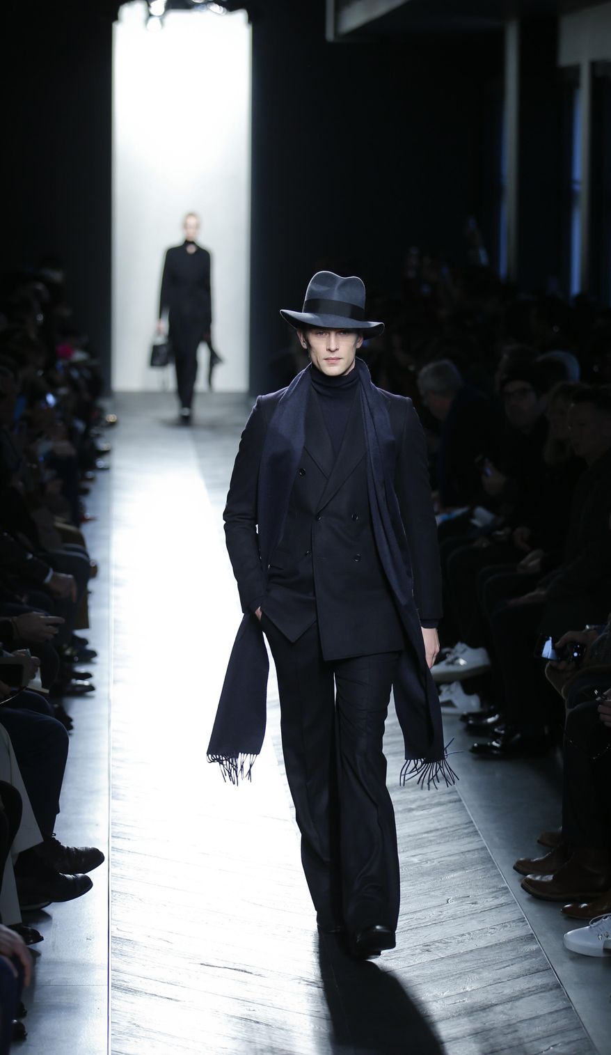 A model wears a creation for Bottega Veneta men's Fall-Winter 2016-2017 collection, part of the Milan Fashion Week, unveiled in Milan, Italy, Sunday, Jan. 17, 2016. (AP Photo/Luca Bruno)