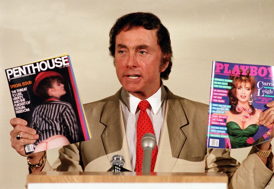 Penthouse publisher and founder Bob Guccione holds up his magazine Penthouse and Playboy magazine at a news conference announcing his anti-censorship campaign at Penthouse magazine offices in New York on June 4, 1986. (Associated Press) **FILE**