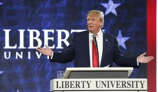 Republican Presidential candidate Donald Trump gestures during a speech at Liberty University in Lynchburg, Va., Monday, Jan. 18, 2016. (AP Photo/Steve Helber) ** FILE **