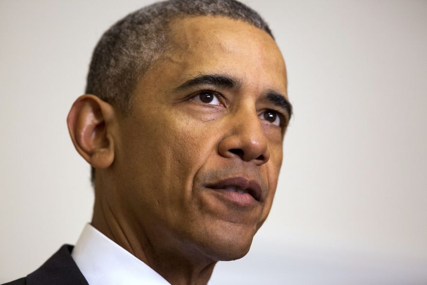 President Barack Obama speaks about the release of Americans by Iran, Sunday, Jan. 17, 2016 in the Cabinet Room of the White House in Washington. (AP Photo/Jacquelyn Martin)